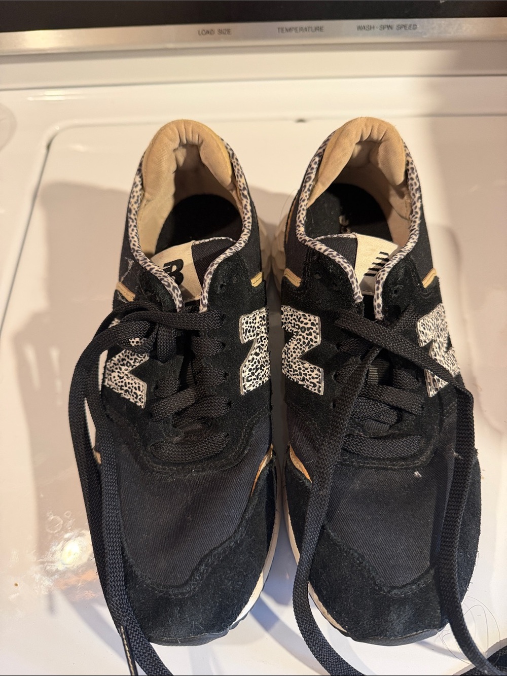 New Balance women Black Sneakers with Leopard Accent